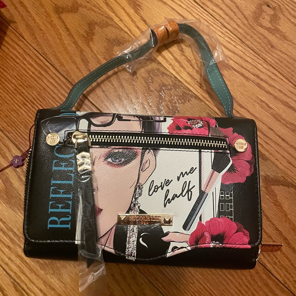 Nicole Lee multifunctional hand bag crossbody wallet.